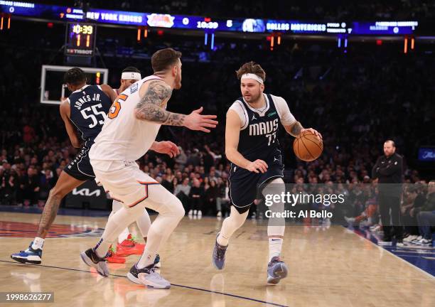 Luka Doncic of the Dallas Mavericks in action against Isaiah Hartenstein of the New York Knicks during their game at Madison Square Garden on...