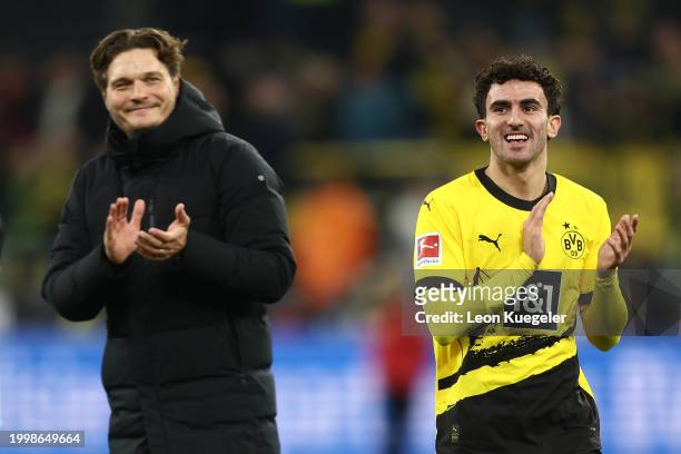 Mateu Morey Bauza of Dortmund celebrates victory with head coach Edin Terzic after the Bundesliga match between Borussia Dortmund and Sport-Club...