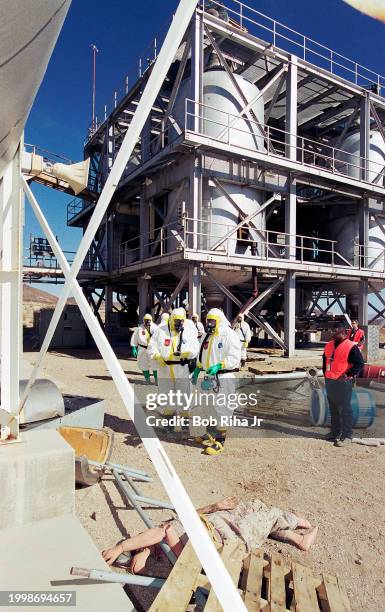 Public Safety First Responders from various United State, state and local agencies wear hazardous materials protective suits during training exercise...