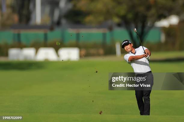 Satoshi Kodaira of Japan plays his second shot on the first hole during the second round of the Astara Golf Championship presented by Mastercard at...