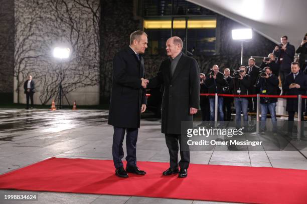 German Chancellor Olaf Scholz welcomes Polish Prime Minister Donald Tusk Tusk's arrival for talks at the Chancellery on February 12, 2024 in Berlin,...