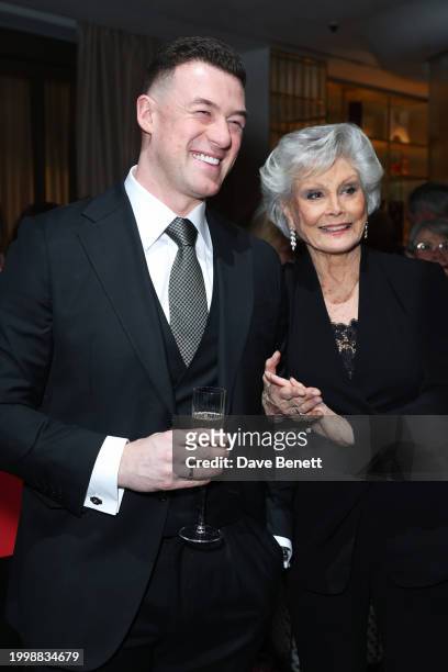Kai Widdrington and Angela Rippon attend a drinks reception hosted by Angela Rippon to celebrate her time on Strictly Come Dancing and the end of the...