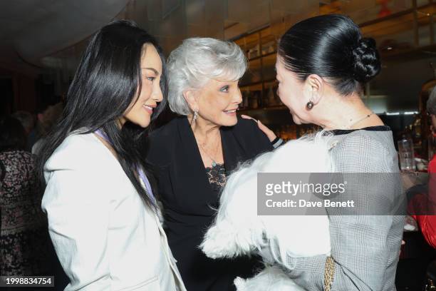 Nancy Xu, Angela Rippon and guest attend a drinks reception hosted by Angela Rippon to celebrate her time on Strictly Come Dancing and the end of the...