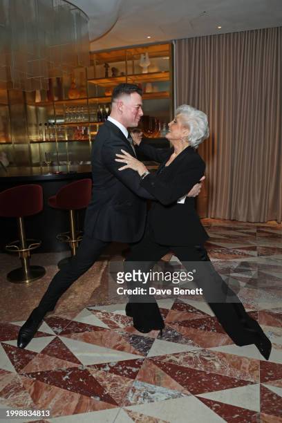 Kai Widdrington and Angela Rippon dance at a drinks reception hosted by Angela Rippon to celebrate her time on Strictly Come Dancing and the end of...