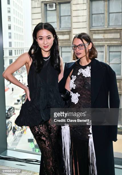 Amber Wang and Irina Kro Eicke attend the Aknvas F/W24 show during February 2024 New York Fashion Week at The Ritz-Carlton New York on February 12,...