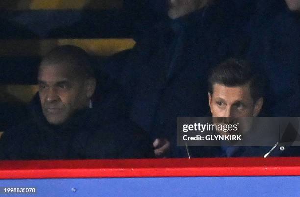 Crystal Palace Ambassador and former player Mark Bright and Crystal Palace's English chairman Steve Parish take their seats for the English Premier...