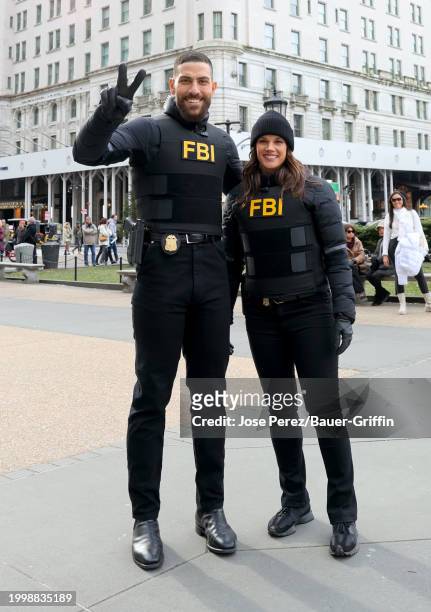 Zeeko Zaki and Missy Peregrym are seen on the set of "FBI" outside the Plaza Hotel on February 12, 2024 in New York City.