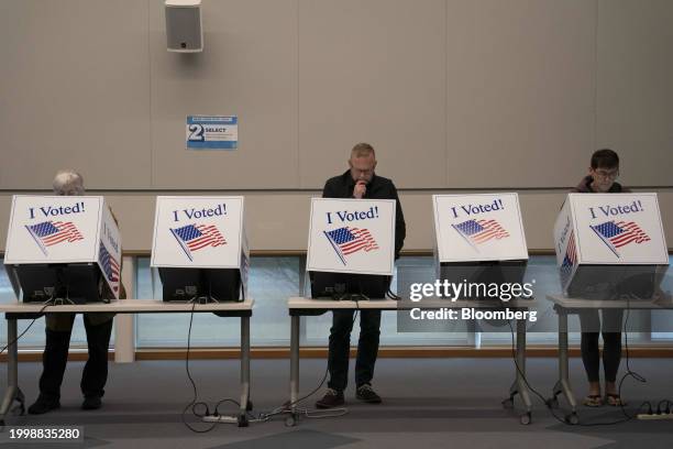 Voters cast their ballots during the first day of early voting at a polling station in Mount Pleasant, South Carolina, US, on Monday, Feb. 12, 2024....