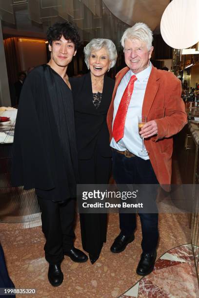 Carlos Gu, Angela Rippon and Stanley Johnson attend a drinks reception hosted by Angela Rippon to celebrate her time on Strictly Come Dancing and the...