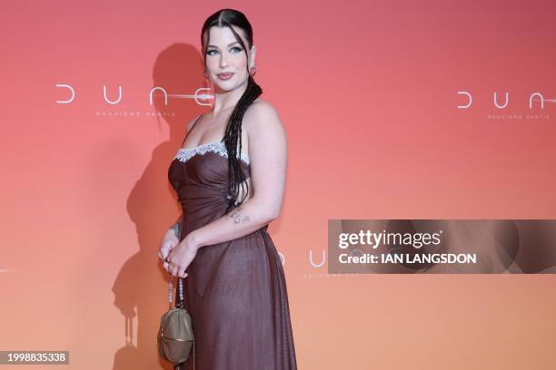 French influencer Marie Lopez aka Enjoy Phoenix poses during a photocall for the preview screening event for the film "Dune: Part Two" at the Le...