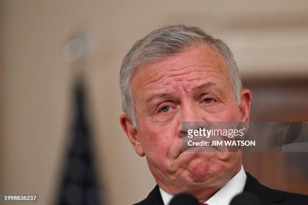 King Abdullah II of Jordan speaks after meeting with US President Joe Biden in the Cross Hall of the White House in Washington, DC, on February 12,...