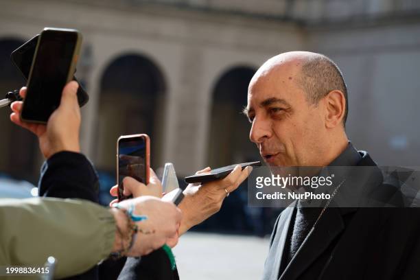 Cardinal Victor Manuel Fernandez is talking to reporters in the St. Damaso courtyard during the audience of Argentinian President Javier Milei with...