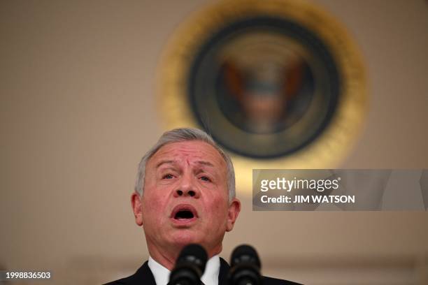 King Abdullah II of Jordan speaks to the press in the Cross Hall of the White House in Washington, DC, on February 12, 2024. Jordan's King Abdullah...