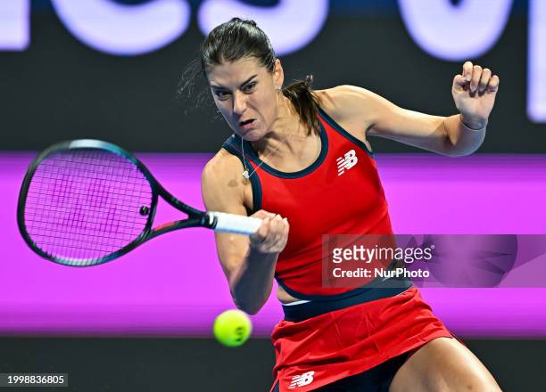 Sorana Cirstea of Romania is playing in her second-round match against Iga Swiatek of Poland at the WTA 1000-Qatar TotalEnergies Open tennis...