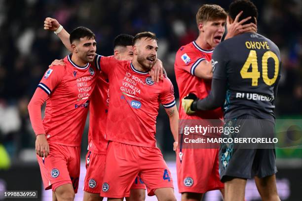 Udinese's Slovenian midfielder Sandi Lovric celebrates with teammates after winning the Italian Serie A football match Juventus vs Udinese on...