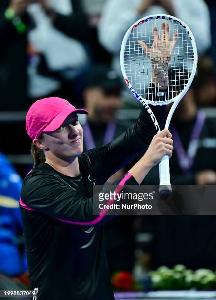 Iga Swiatek of Poland is celebrating after winning her second-round match against Sorana Cirstea of Romania at the WTA 1000-Qatar TotalEnergies Open...