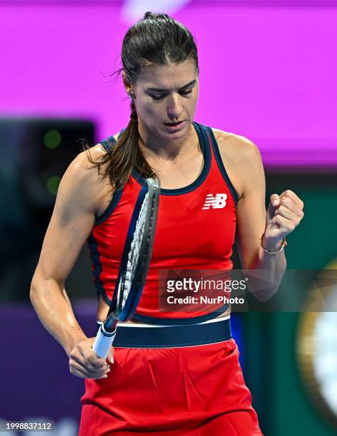 Sorana Cirstea of Romania is reacting during her second-round match against Iga Swiatek of Poland at the WTA 1000-Qatar TotalEnergies Open tennis...