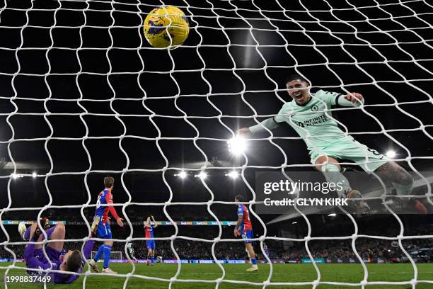 Chelsea's Argentinian midfielder Enzo Fernandez hammers the ball into the back of the net after Chelsea's English midfielder Conor Gallagher scores...