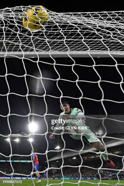 Chelsea's Argentinian midfielder Enzo Fernandez hammers the ball into the back of the net after Chelsea's English midfielder Conor Gallagher scores...