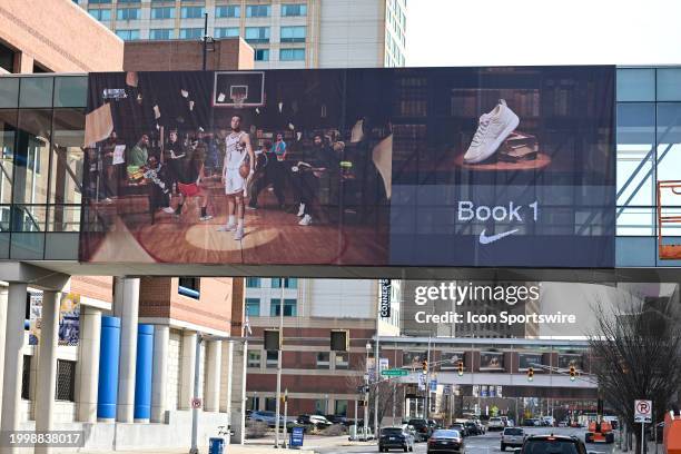 All-Star game signage featuring a Nike ad for Phoenix Suns guard Devin Booker and his "Book 1" line of shoes displayed on a walking bridge prior to...