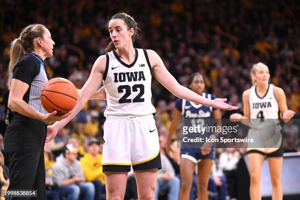 Iowa guard Caitlin Clark reacts to an official's foul call during a women's college basketball game between the Penn State Nittany Lions and the Iowa...