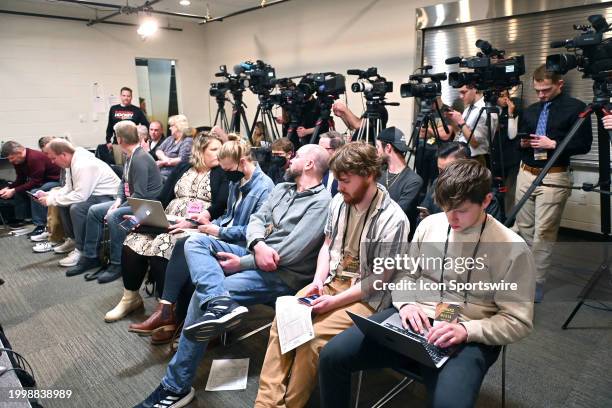 General view of the media crush in the interview room after Iowa won a women's college basketball game between the Penn State Nittany Lions and the...