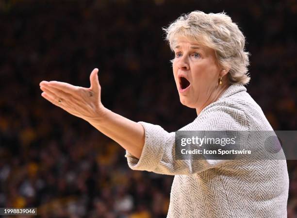 Iowa head coach Lisa Bluder reacts to an official's call during a women's college basketball game between the Penn State Nittany Lions and the Iowa...