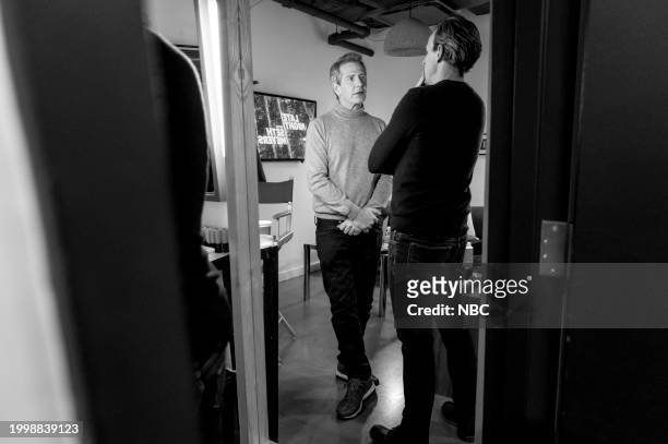 Episode 1484 -- Pictured: Actor Ben Mendelsohn talks with host Seth Meyers backstage on February 12, 2024 --