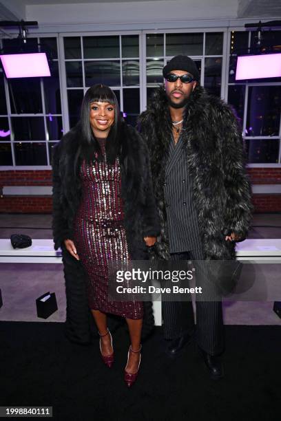 Janelle James and Dwain Thomas attend the Sergio Hudson F/W24 show during February 2024 New York Fashion Week at the Starrett-Lehigh Building on...