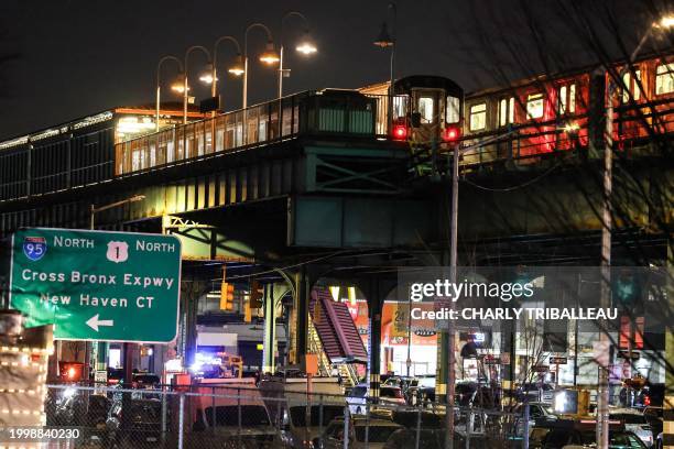 Train stands at the Mt. Eden Avenue subway station in the Bronx borough of New York after six people were injured with one person in critical...