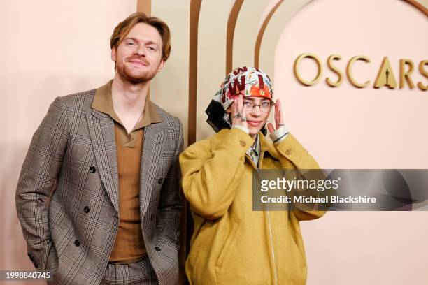 Beverly Hills , CA Finneas O'Connell and US singer/songwriter Billie Eilish arriving at the 2024 Oscars Nominees Luncheon Red Carpet at the The...