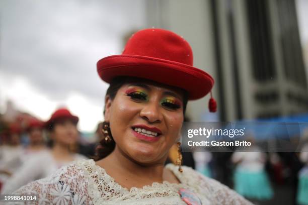 Woman wearing traditional clothes dances as Chola during the 2024 La Paz Carnival on February 12, 2024 in La Paz, Bolivia. The Jisk'a Anata, also...