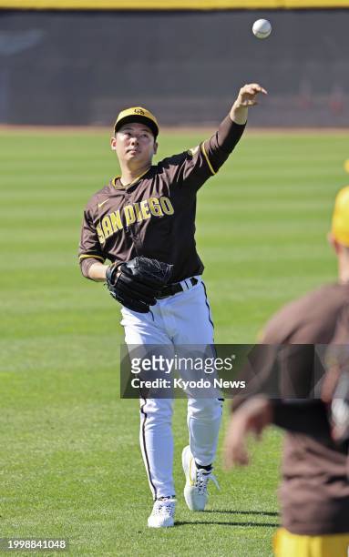 Yuki Matsui plays catch at spring training with the San Diego Padres in Peoria, Arizona, on Feb. 12, 2024.