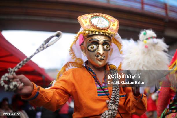 Man wearing traditional clothes dances Llamerada during the 2024 La Paz Carnival on February 12, 2024 in La Paz, Bolivia. The Jisk'a Anata, also know...