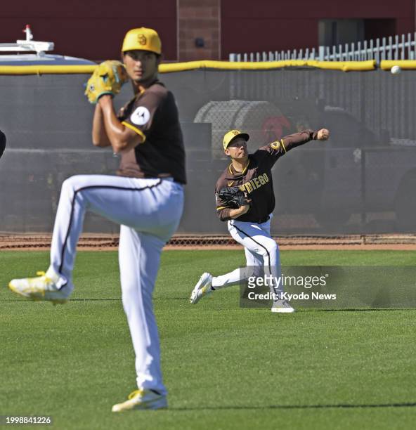 Yu Darvish plays catch at spring training with the San Diego Padres in Peoria, Arizona, on Feb. 12, 2024.