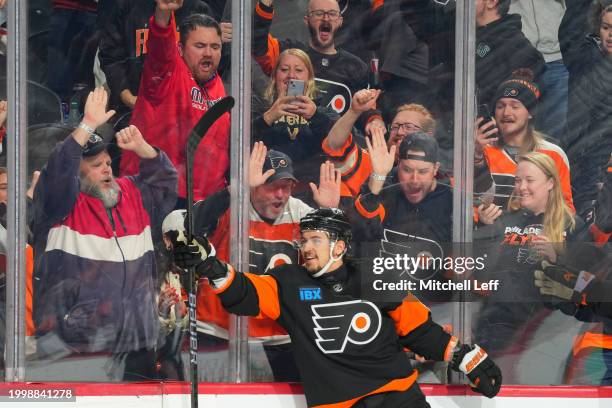 Fans react after a goal by Travis Konecny of the Philadelphia Flyers against the Arizona Coyotes in the second period at the Wells Fargo Center on...