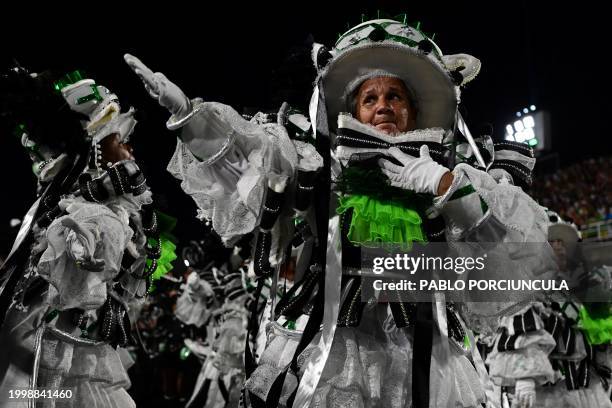 Members of Mocidade Independente do Padre Miguel samba school perform during the last night of the Carnival parade at the Marques de Sapucai...