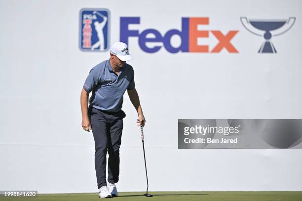 Alex Noren of Sweden reads the 16th green during the final round of WM Phoenix Open at TPC Scottsdale on February 11, 2024 in Scottsdale, Arizona.