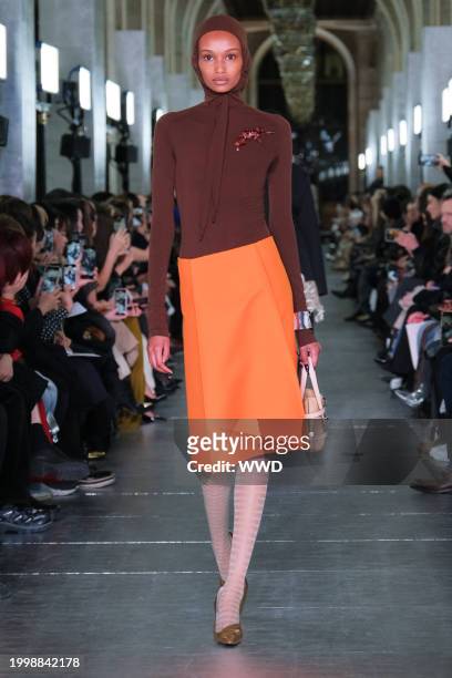 Model walks the runway at Tory Burch RTW Fall 2024 as part of New York Ready to Wear Fashion Week held at the New York Public Library on February 12,...