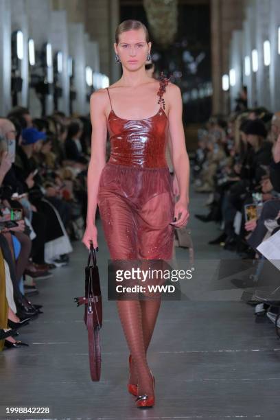 Model walks the runway at Tory Burch RTW Fall 2024 as part of New York Ready to Wear Fashion Week held at the New York Public Library on February 12,...