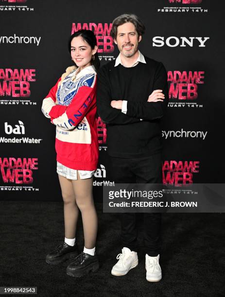 Canadian-US director Jason Reitman and his daughter Josephine arrive for the premiere of Sony's "Madame Web" in Los Angeles, California, on February...
