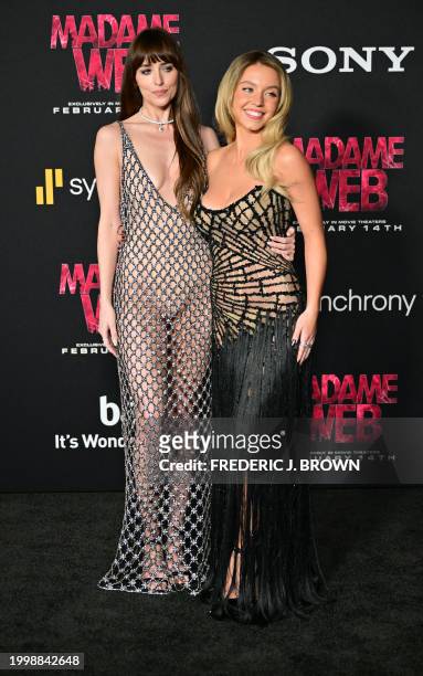 Actress Dakota Johnson and US actress Sydney Sweeney arrive for the premiere of Sony's "Madame Web" in Los Angeles, California, on February 12, 2024.