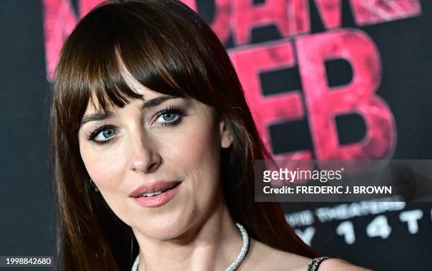 Actress Dakota Johnson arrives for the premiere of Sony's "Madame Web" in Los Angeles, California, on February 12, 2024.