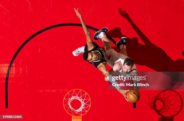 Victor Wembanyama of the San Antonio Spurs blocks the ball during the game against the Toronto Raptors on February 12, 2024 at the Scotiabank Arena...