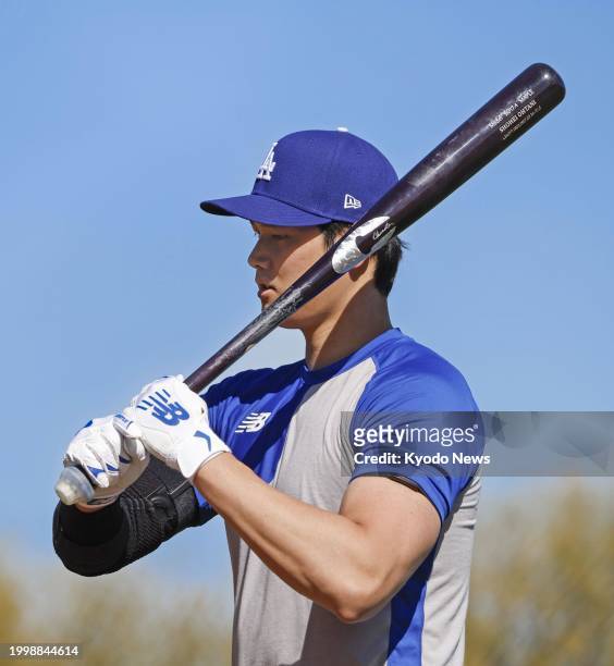 Shohei Ohtani prepares to take batting practice at spring training with the Los Angeles Dodgers in Glendale, Arizona, on Feb. 12, 2024.