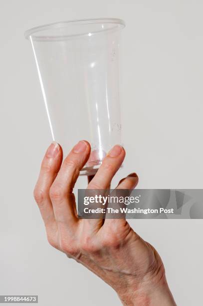 January 31: Eve Vitale, chief executive of SPE Foundation, holds a plastic cup at Warren Mott High School in Warren, Michigan on January 31, 2024.