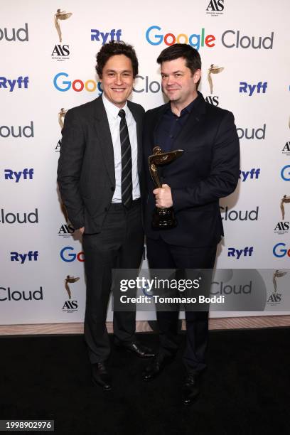 Phil Lord and Chris Miller pose with the Best Feature - Animation Award for 'Spider-Man: Across the Spider-Verse' during the 14th Advanced Imaging...