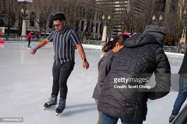 People skate in Millennium Park despite temperatures near 60 Fahrenheit degrees, more than 20 degrees above normal on February 09, 2024 in Chicago,...