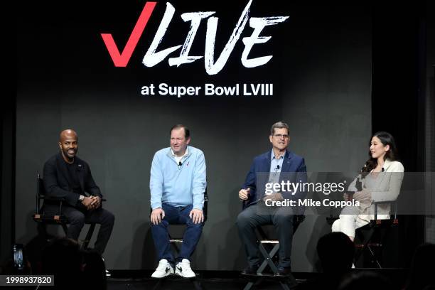 Gary Brantley, Kyle Malady, Jim Harbaugh, and Mina Kimes speak onstage during Verizon’s press conference at Verizon Live at Super Bowl LVIII on...