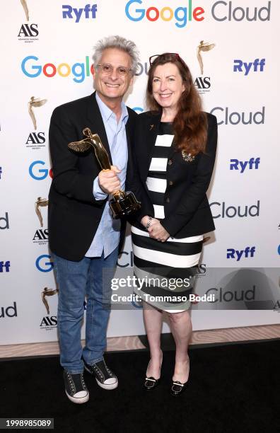 Sound Editor Mark Mangini, with the award for Best Documentary winner “32 Sounds” with Barbara Marshall, HP, at the 14th and Barbara Marshall attend...